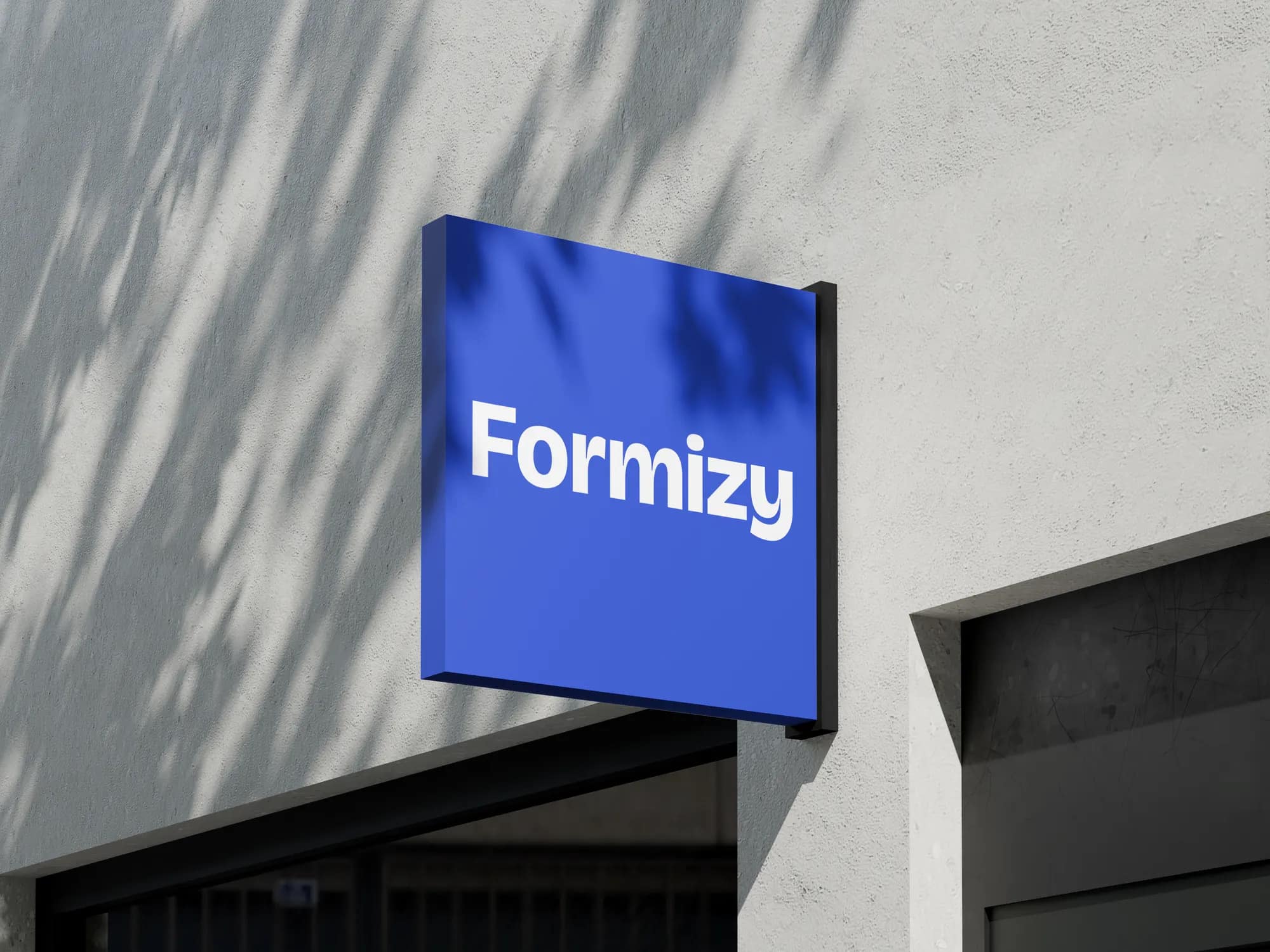 Une enseigne bleue Formizy accrochée à un mur